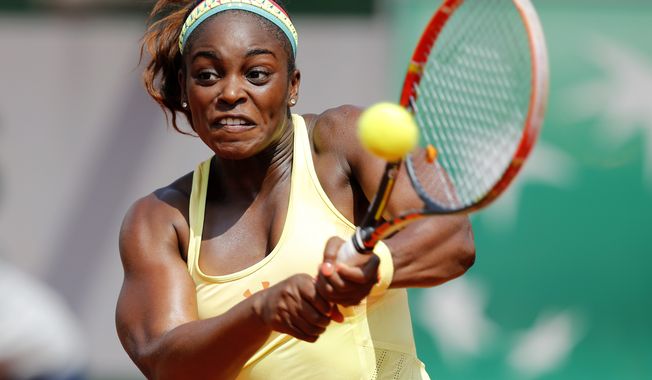 Sloane Stephens of the U.S. returns the ball during the third round match of the French Open tennis tournament against Russia&#x27;s Ekaterina Makarova at the Roland Garros stadium, in Paris, France, Saturday, May 31, 2014. Stephens won on two sets 6-3, 6-4. (AP Photo/David Vincent)