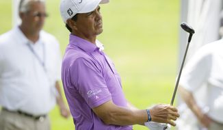 Tom Pernice Jr. watches his shot off the first tee during the final round of the Champions Tour&#39;s Principal Charity Classic golf tournament on Sunday, June 1, 2014, in Des Moines, Iowa. (AP Photo/Charlie Neibergall)
