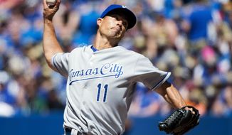 Kansas City Royals starting pitcher Jeremy Guthrie works against the Toronto Blue Jays during the seventh inning of baseball game in Toronto on Sunday, June 1, 2014. (AP Photo/The Canadian Press, Nathan Denette)