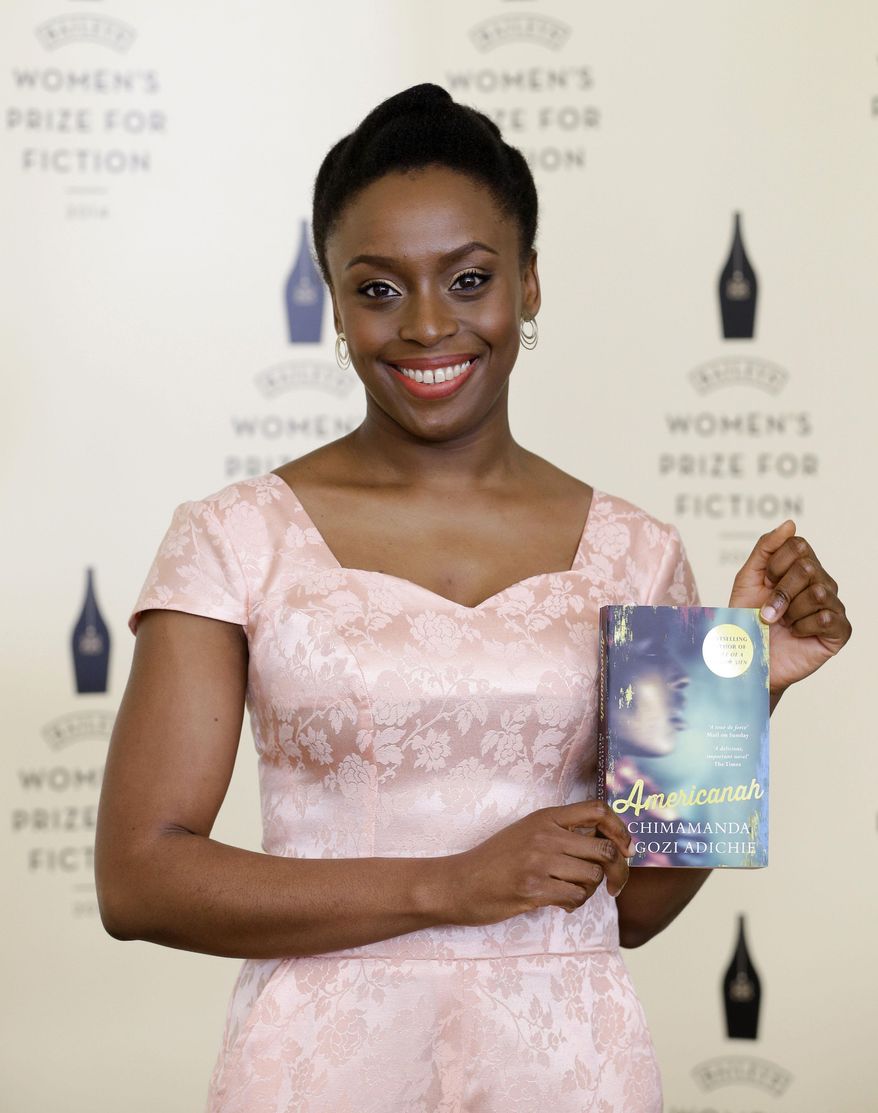 Chimamanda Ngozi Adichie – Americanah, one of the authors shortlisted for the Bailey's Women's Prize for Fiction during a photocall ahead of the awards ceremony at the Royal Festival Hall in London, Wednesday, June 4, 2014. The Baileys Women’s Prize for Fiction is the UK’s only annual book award for fiction written by a woman. (AP Photo/Kirsty Wigglesworth)