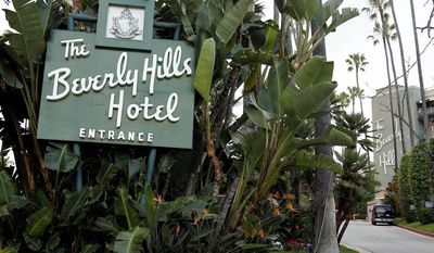 FILE - In this April 25, 2012 file photo, the entrance to the Beverly Hills Hotel is seen in Beverly Hills, Calif.  Hollywood is responding to harsh new laws in Brunei by boycotting the Beverly Hills Hotel. The Motion Picture &amp;amp; Television Fund joined a growing list of organizations and individuals Monday, May 5, 2014, refusing to do business with hotels owned by the Sultan or government of Brunei to protest the country’s new penal code that calls for punishing adultery, abortions and same-sex relationships with flogging and stoning.  (AP Photo/Matt Sayles, File)