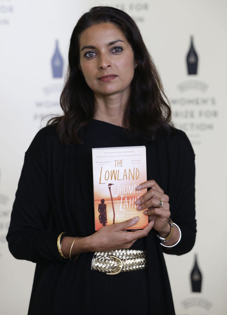 Jhumpa Lahiri – The Lowland, one of the authors shortlisted for the Bailey's Women's Prize for Fiction during a photocall ahead of the awards ceremony at the Royal Festival Hall in London, Wednesday, June 4, 2014. The Baileys Women’s Prize for Fiction is the UK’s only annual book award for fiction written by a woman. (AP Photo/Kirsty Wigglesworth)