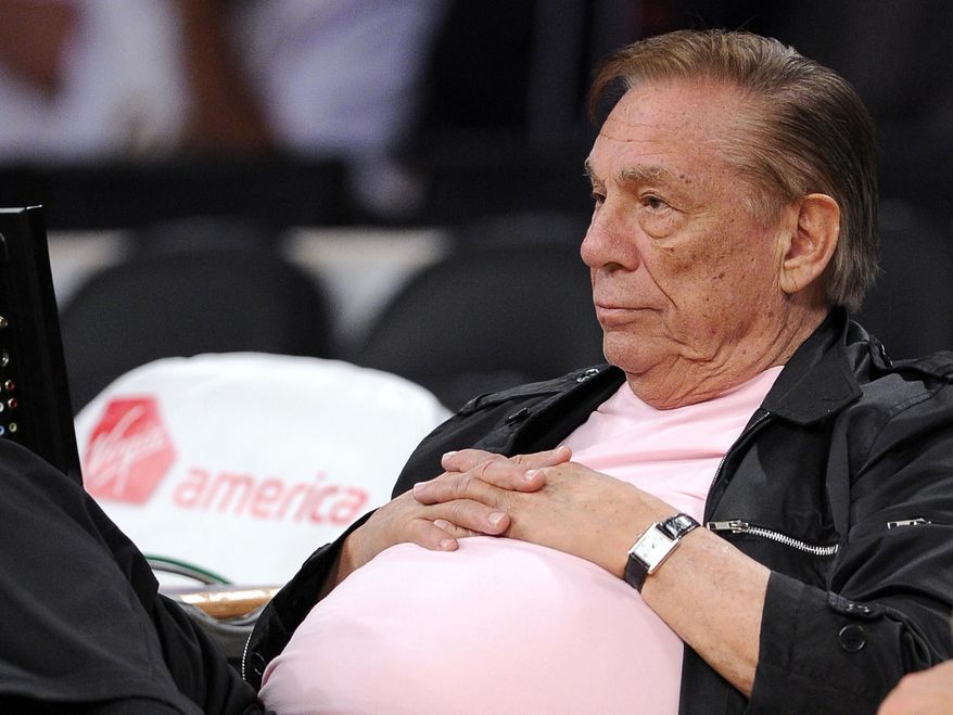 FILE - In this Oct. 17, 2010 file photo, Los Angeles Clippers team owner Donald Sterling watches his team play in Los Angeles. Sterling agreed Wednesday June 4, 2014 to sign off on selling the team he has owned for 33 years to former Microsoft CEO Steve Ballmer for $2 billion, bringing the possibility of a resolution to weeks of rumors, uncertainty and looming possibilities for legal action. (AP Photo/Mark J. Terrill, File)