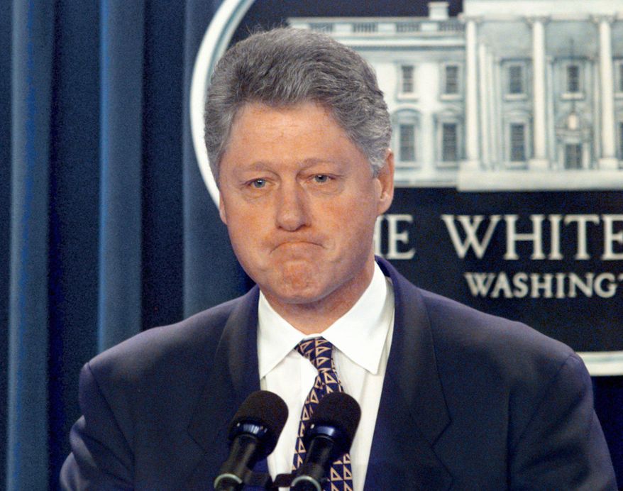 ** FILE ** Former President Bill Clinton meets reporters in the briefing room of the White House in Washington, Jan. 18, 1996. (AP Photo/Doug Mills, File)