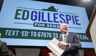 Republican senatorial hopeful Ed Gillespie gestures prepares to address the Virginia GOP Convention in Roanoke, Va., Saturday, June 7, 2014.  The GOP is selecting a nominee to face US Sen. Mark Warner in the fall election.    (AP Photo/Steve Helber)