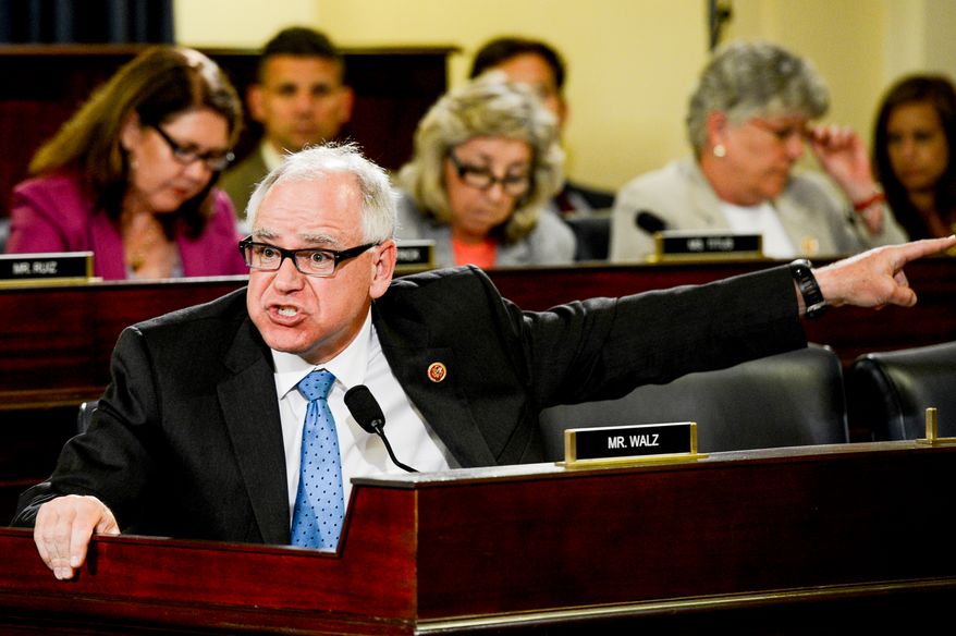Rep. Tim Walz (D-Minn.) speaks as Government Accountability Office health care director Debra Draper, Veteran Affairs Undersecretary for Health for Administrative Operations Assistant Deputy Philip Matkovsky, Acting Veterans Affairs Inspector General Richard Griffin, and  Assistant Veterans Affairs Inspector General for Audits and Evaluations Linda Halliday testify at a House Veterans&#39; Affairs Committee hearing on Capitol Hill, Washington, D.C., Monday, June 9, 2014. (Andrew Harnik/The Washington Times)