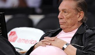 FILE - In this Oct. 17, 2010 file photo, Los Angeles Clippers team owner Donald Sterling watches his team play in Los Angeles. Sterling has pulled his support from a deal to sell the team to former Microsoft CEO Steve Ballmer and will pursue his $1 billion federal lawsuit against the NBA, his attorney said Monday, June 9, 2014. (AP Photo/Mark J. Terrill, File)