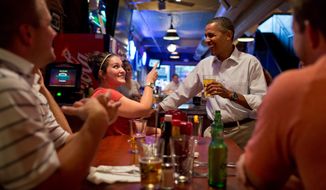 President Barack Obama has a beer with patrons at the Pump Haus Pub and Grill in Waterloo, Iowa, Aug. 14, 2012. (Official White House Photo by Pete Souza)

This official White House photograph is being made available only for publication by news organizations and/or for personal use printing by the subject(s) of the photograph. The photograph may not be manipulated in any way and may not be used in commercial or political materials, advertisements, emails, products, promotions that in any way suggests approval or endorsement of the President, the First Family, or the White House.&amp;#202;
