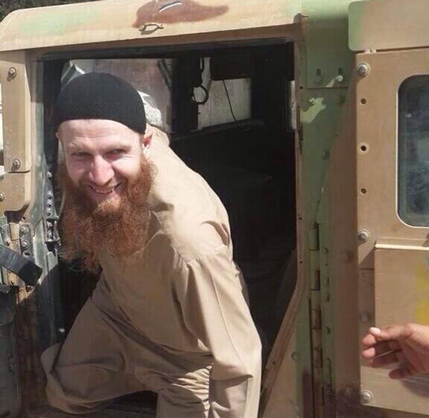 A Sunni military leader of The Islamic State of Iraq and Syria inspects a stolen U.S. military Humvee. (Image: Twitter, Jenan Moussa of Al Aan TV)