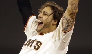 San Francisco Giants&#x27; Michael Morse celebrates after making the game winning hit in the ninth inning of a baseball game against the New York Mets Saturday, June 7, 2014, in San Francisco. (AP Photo/Ben Margot)
