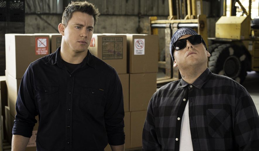 This image released by Sony Pictures shows Jonah Hill, right, and Channing Tatum in Columbia Pictures' "22 Jump Street." (AP Photo/Sony Pictures, Glen Wilson)