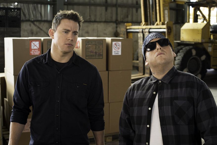 This image released by Sony Pictures shows Jonah Hill, right, and Channing Tatum in Columbia Pictures' "22 Jump Street." (AP Photo/Sony Pictures, Glen Wilson)