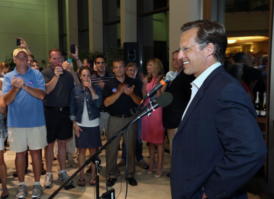 Dave Brat speaks to supporters Tuesday after defeating Republican Congressman Eric Cantor in Tuesday&#x27;s Republican primary for the 7th Congressional District in Virginia. Mr. Brat, who called his win &quot;a miracle&quot; was not ready to discuss policy with the press Wednesday. (Associated Press)