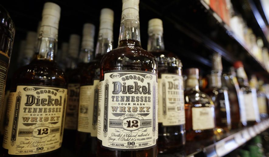 In this file photo, bottles of George Dickel Tennessee whiskey are displayed in a liquor store Tuesday, June 10, 2014, in Nashville, Tennessee. On April 11, 2018, the Tennessee state legislature passed a bill to allow liquor and grocery stores to sell wine and spirits on Sundays. (AP Photo/Mark Humphrey) **FILE**