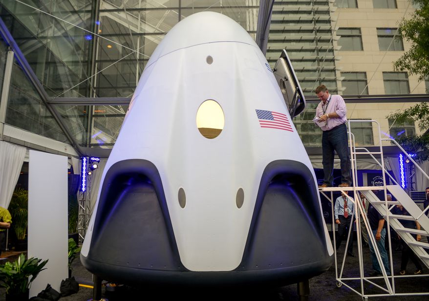SpaceX CEO and Chief Designer Elon Musk introduces the companies next generation Dragon spacecraft at an event held at the Newseum, Washington, D.C., Tuesday, June 10, 2014. (Andrew Harnik/The Washington Times)