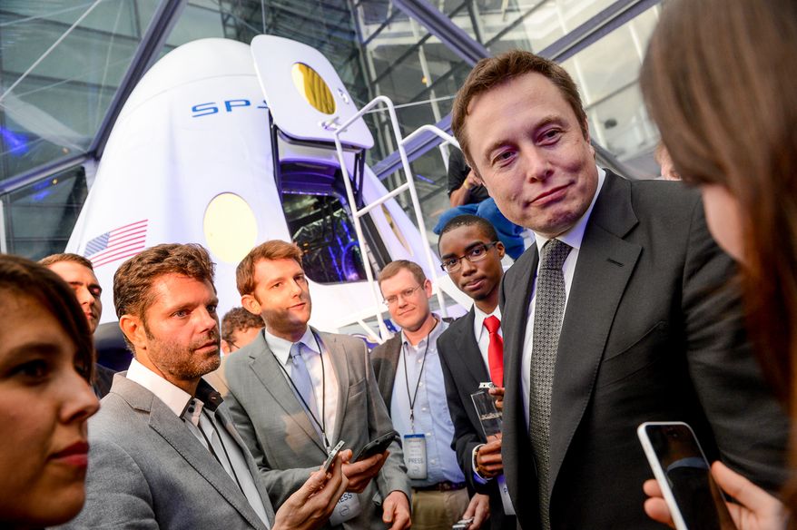 SpaceX CEO and Chief Designer Elon Musk speaks to reporters as he introduces the companies next generation Dragon spacecraft at an event held at the Newseum, Washington, D.C., Tuesday, June 10, 2014. (Andrew Harnik/The Washington Times)