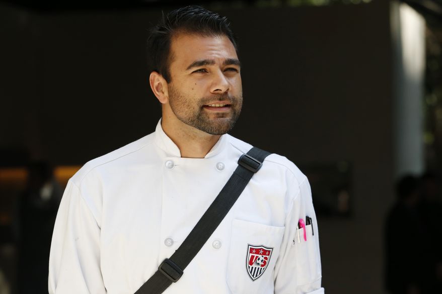 United States men's soccer team chef Bryson Billapando waits for the team to arrive at the team hotel in Sao Paulo, Brazil, Monday, June 9, 2014. The U.S. will play in group G of the 2014 soccer World Cup. (AP Photo/Julio Cortez)