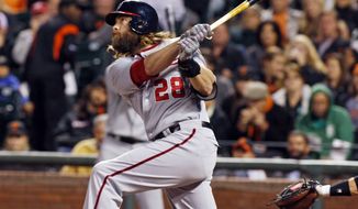 Washington Nationals&#39; Jason Werth hits a home run against the San Francisco Giants during the fifth inning of a baseball game, Wednesday, June 11, 2014, in San Francisco. (AP Photo/George Nikitin)