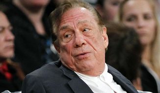 ** FILE ** In this Dec. 19, 2011, file photo, Los Angeles Clippers owner Donald Sterling gestures while watching the Clippers play the Los Angeles Lakers during an NBA preseason basketball game in Los Angeles. (AP Photo/Danny Moloshok, File)