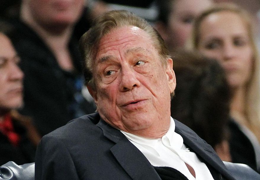 ** FILE ** In this Dec. 19, 2011, file photo, Los Angeles Clippers owner Donald Sterling gestures while watching the Clippers play the Los Angeles Lakers during an NBA preseason basketball game in Los Angeles. (AP Photo/Danny Moloshok, File)