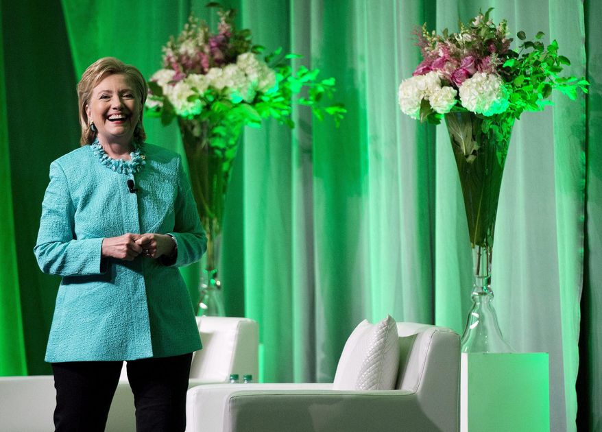 Former U.S. Secretary of State Hillary Rodham Clinton discusses her new book "Hard Choices" in Toronto on Monday, June 16, 2014. In excerpts published Monday, June 16, 2014, Clinton told weekly German magazine Stern that the U.S. lags behind countries such as Germany, Chile and Brazil because it's never had a woman as head of state or government. (AP Photo/The Canadian Press, Nathan Denette)