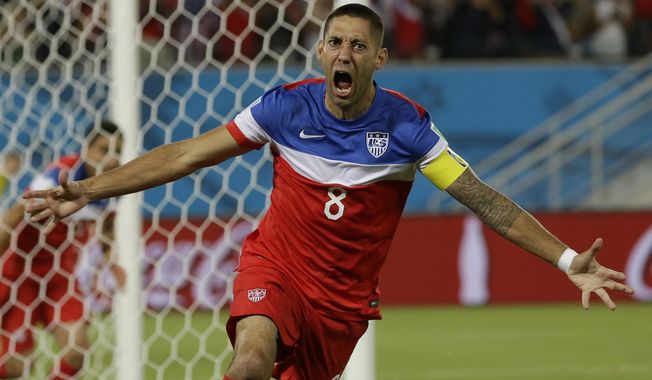 United States' Clint Dempsey celebrates after scoring the opening goal during the group G World Cup soccer match between Ghana and the United States at the Arena das Dunas in Natal, Brazil, Monday, June 16, 2014.  (AP Photo/Ricardo Mazalan)