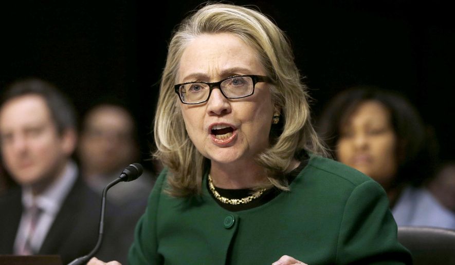 This Jan. 23, 2013 shows then-Secretary of State Hillary Rodham Clinton testifying on Capitol Hill on the deadly attack on the U.S. diplomatic mission in Benghazi, Libya, that killed Ambassador Chris Stevens and three other Americans. (AP Photo/Pablo Martinez Monsivais, File)