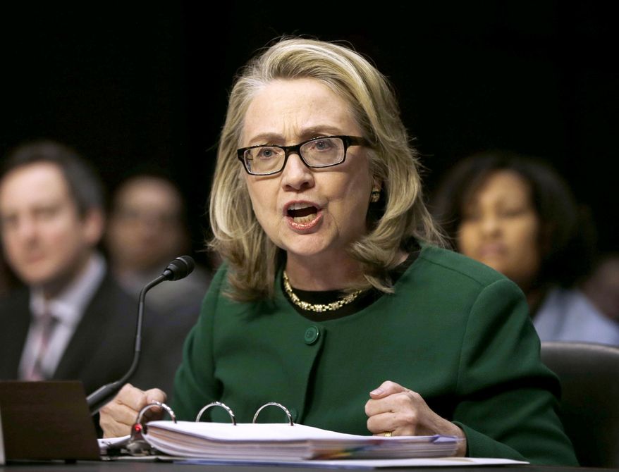 This Jan. 23, 2013 shows then-Secretary of State Hillary Rodham Clinton testifying on Capitol Hill on the deadly attack on the U.S. diplomatic mission in Benghazi, Libya, that killed Ambassador Chris Stevens and three other Americans. (AP Photo/Pablo Martinez Monsivais, File)