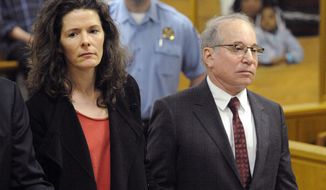 FILE - In this May 16, 2014 file photo, Paul Simon, right, and his wife, Edie Brickell, make a brief appearance in Superior Court in Norwalk, Conn., for a disorderly conduct case about an April 26 argument inside a cottage on their New Canaan property. The couple had been scheduled to return to court Tuesday, June 17, 2014, but prosecutors declined to pursue the case. The charges will be dropped and eventually erased after 13 months. (AP Photo/New York Post, Douglas Healey, Pool, File)