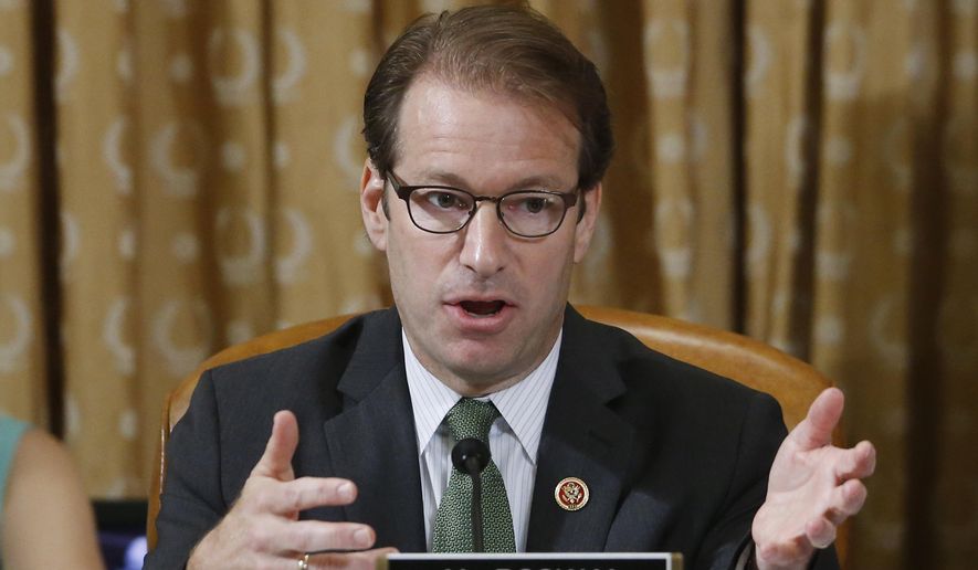 Rep. Peter Roskam, R-Ill., is seen at a hearing of the House Ways and Means Committee on Capitol Hill in Washington in this May 17, 2013, file photo. (AP Photo/Charles Dharapak, File)