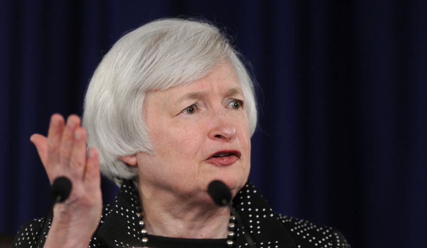 Federal Reserve Chair Janet Yellen speaks during a news conference at the Federal Reserve in Washington, Wednesday, June 18, 2014. The Federal Reserve has sharply cut its forecast for U.S. growth this year, reflecting a shrinking economy last quarter caused mostly by harsh weather. (AP Photo/Susan Walsh)