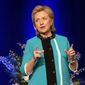 Former U.S. Secretary of State Hillary Rodham Clinton delivers a keynote address during a luncheon in Edmonton, Alberta on Wednesday June 18, 2014. (AP Photo/The Canadian Press, Jason Franson)