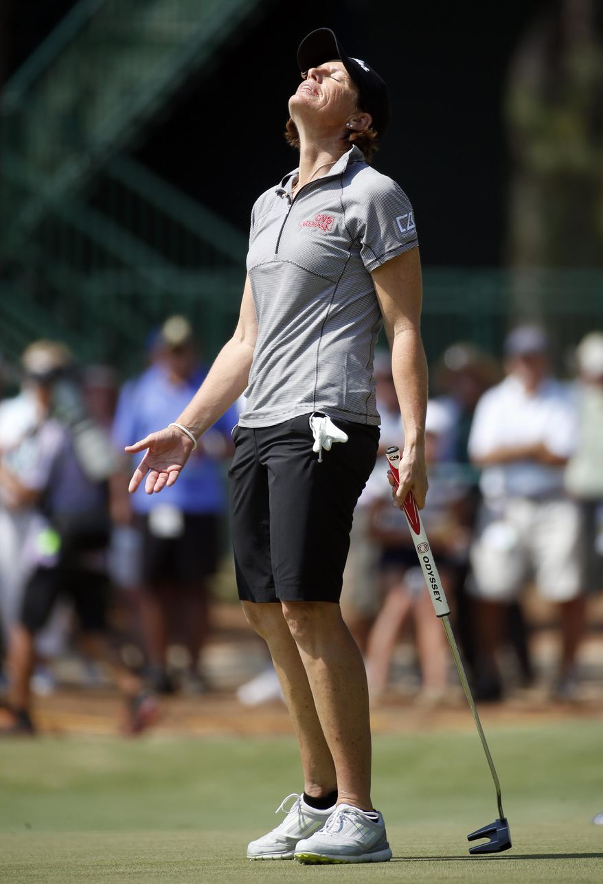 Juli Inkster reacts after missing a putt on the seventh hole during the first round of the U.S. Women's Open golf tournament in Pinehurst, N.C., Thursday, June 19, 2014. (AP Photo/John Bazemore)