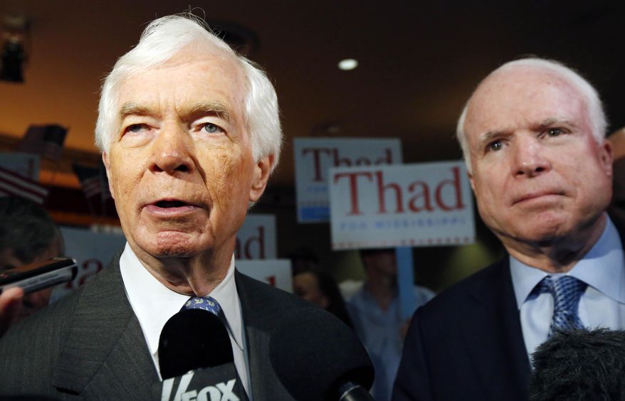 Sen. Thad Cochran of Mississippi and Sen. John McCain of Arizona at a rally. (AP Photo/Rogelio V. Solis)