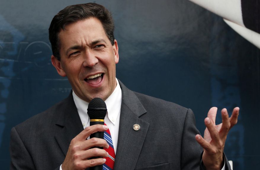 State Sen. Chris McDaniel, R-Ellisville, speaks at a rally on his behalf in Flowood, Miss., Monday, June 23, 2014. McDaniel is in a runoff against long-time U.S. Sen. Thad Cochran for the GOP nomination for senate. (AP Photo/Rogelio V. Solis)