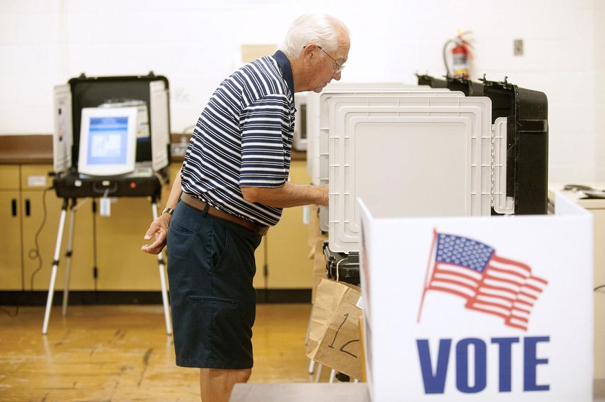 Bill Boteler votes in the state's primary elections at the Annapolis Middle School, Tuesday, June 24, 2014, in Annapolis, Md. Maryland voters are going to the polls to choose candidates for governor, attorney general and various state and local offices. (AP Photo/Capital Gazette, Joshua McKerrow) **FILE**