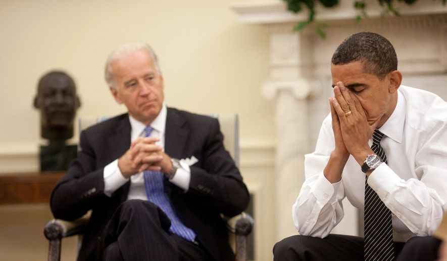 President Barack Obama and Vice President Joe Biden in the Oval Office during the President&#39;s Daily Economic Briefing on July 30, 2009. (White House)
