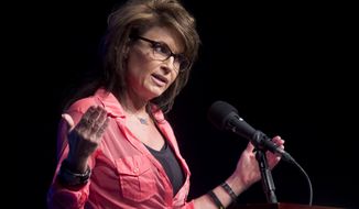 ** FILE ** Former Alaska governor and Republican vice presidential nominee Sarah Palin speaks to the crowd in Sevierville, Tenn., on Thursday, June 26, 2014. (AP Photo/The Knoxville News Sentinel, Saul Young) 