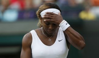 Serena Williams of U.S. gestures after losing a point to Alize Cornet of France during their women&#x27;s singles match at the All England Lawn Tennis Championships in Wimbledon, London, Saturday, June 28, 2014. (AP Photo/Sang Tan)