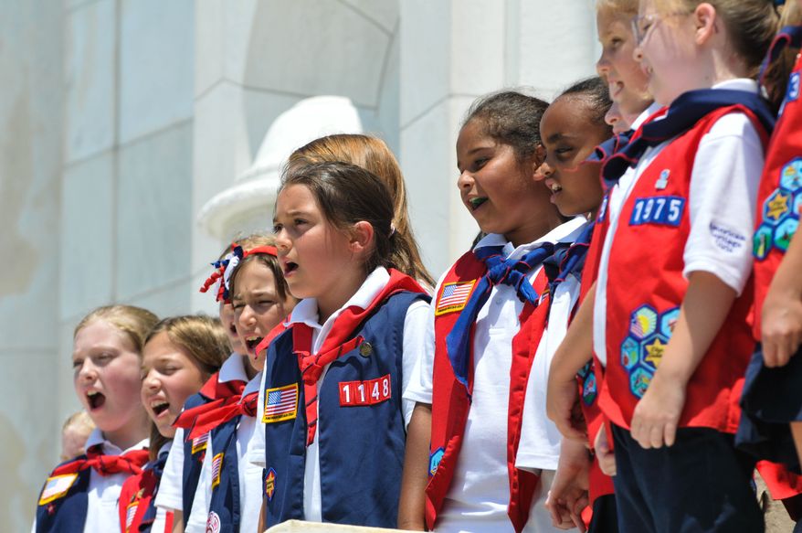 Altos and Sopranos! Members of the American Heritage Girls performed patriotic songs at the Arlington National Cemetery Memorial Amphitheater after the members of the group placed a wreath at the Tomb of the Unknown Soldiers on Sunday, June 29 at Arlington National Cemetery Memorial Amphitheater. Khalid Naji-Allah/Special to The Washington Times.