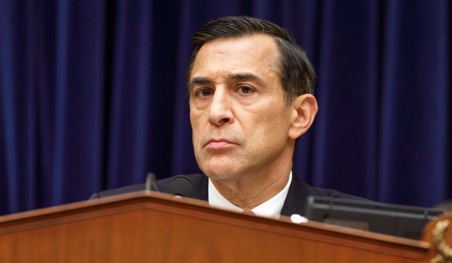 ** FILE ** Rep. Darrell Issa, R-Calif., the chairman of the House Oversight Committee, questions Internal Revenue Service Commissioner John Koskinen as lawmakers continue their probe of whether tea party groups were improperly targeted for increased scrutiny by the IRS, on Capitol Hill in Washington, Monday, June 23, 2014. (AP Photo/J. Scott Applewhite)