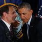 ** FILE ** President Obama nominated former Procter &amp; Gamble executive and Army veteran Bob McDonald, left, to be the next Veterans Affairs secretary. (Associated Press)