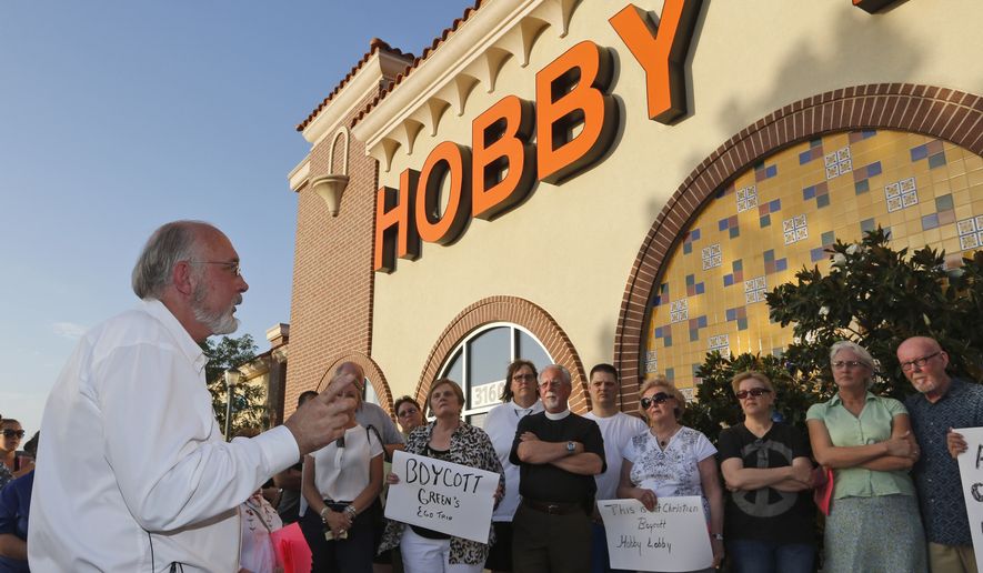 The Rev. Bruce Prescott, left, speaks during a vigil outside a Hobby Lobby store in Edmond, Okla., Monday, June 30, 2014, in reaction to the Supreme Court&#39;s decision that some companies like the Oklahoma-based Hobby Lobby chain of arts-and-craft stores can avoid the contraceptives requirement in President Barack Obama&#39;s health care overhaul, if they have religious objections. (AP Photo/Sue Ogrocki) ** FILE **
