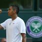 Nick Kyrgios of Australia celebrates after winning a point against Rafael Nadal of Spain during their men&#39;s singles match on Centre Court at the All England Lawn Tennis Championships in Wimbledon, London, Tuesday, July 1, 2014. (AP Photo/Ben Curtis)