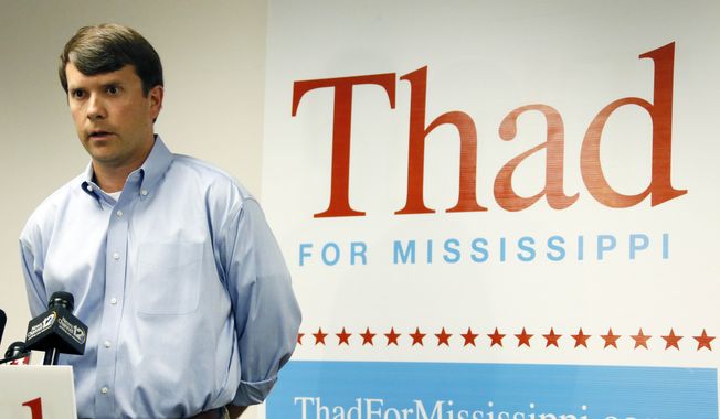 Austin Barbour, a senior advisor with U.S. Sen. Thad Cochran&#x27;s reelection campaign responds to the voting irregularities allegations made by state Sen. Chris McDaniel, R-Ellisville, and a number of his supporters, at a news conference in Jackson, Miss., Wednesday, July 2, 2014.   Barbour challenged McDaniel and his supporters to go &quot;put up or shut up,&quot; with evidence to prove the allegations of illegal voting. (AP Photo/Rogelio V. Solis)