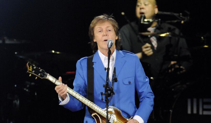 Sir Paul McCartney performs with his band during the “Out There&amp;quot; Tour at the Times Union Center on Saturday, July 5, 2014, in Albany, N.Y. (Photo by Hans Pennink/Invision/AP) ** FILE **