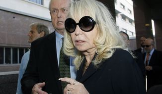 Shelly Sterling, the estranged wife of Los Angeles Clippers owner Donald Sterling, arrives at a Los Angeles courthouse with her attorney Pierce O&#39; Donnell, Monday, July 7, 2014. With the potentially record-breaking $2 billion sale of the Clippers hanging in the balance, a trial beginning Monday will focus on Shelly Sterling had the authority under terms of a family trust to unilaterally negotiate the deal.  (AP Photo/Nick Ut)