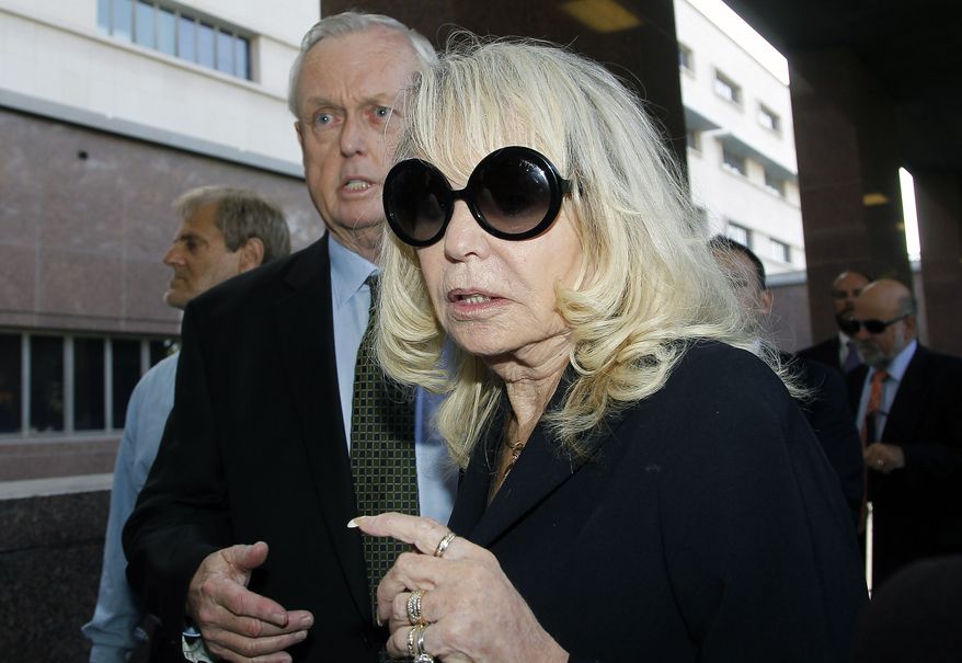 Shelly Sterling, the estranged wife of Los Angeles Clippers owner Donald Sterling, arrives at a Los Angeles courthouse with her attorney Pierce O' Donnell, Monday, July 7, 2014. With the potentially record-breaking $2 billion sale of the Clippers hanging in the balance, a trial beginning Monday will focus on Shelly Sterling had the authority under terms of a family trust to unilaterally negotiate the deal. (AP Photo/Nick Ut)
