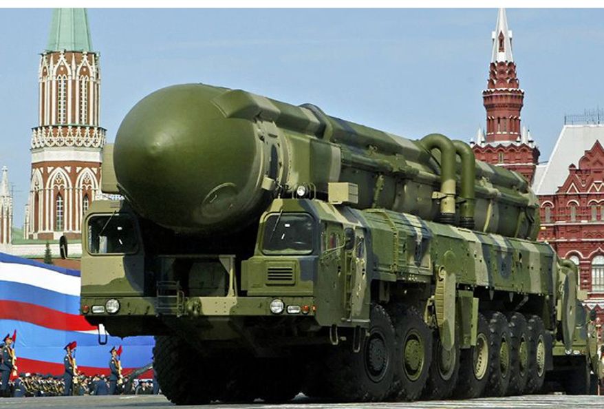 ** FILE ** A Russian truck-mounted Topol intercontinental ballistic missile is showcased during Moscow&#39;s annual Victory Day parade in Red Square. (Associated Press)