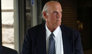 Former Minnesota Gov. Jesse Ventura makes his way back into Warren E. Burger Federal Building during the first day of jury selection in a defamation lawsuit, Tuesday, July 8, 2014 in St. Paul, Minn. Ventura filed the defamation lawsuit against the late Navy Seal Chris Kyle&#39;s estate, claiming that Kyle&#39;s account of a bar fight in a book he wrote was false. (AP Photo/Jim Mone)